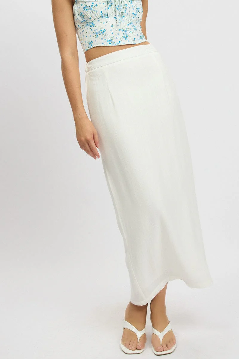 High-Waisted Maxi Skirts with Fitted Tops - spring outfit ideas for curvy women